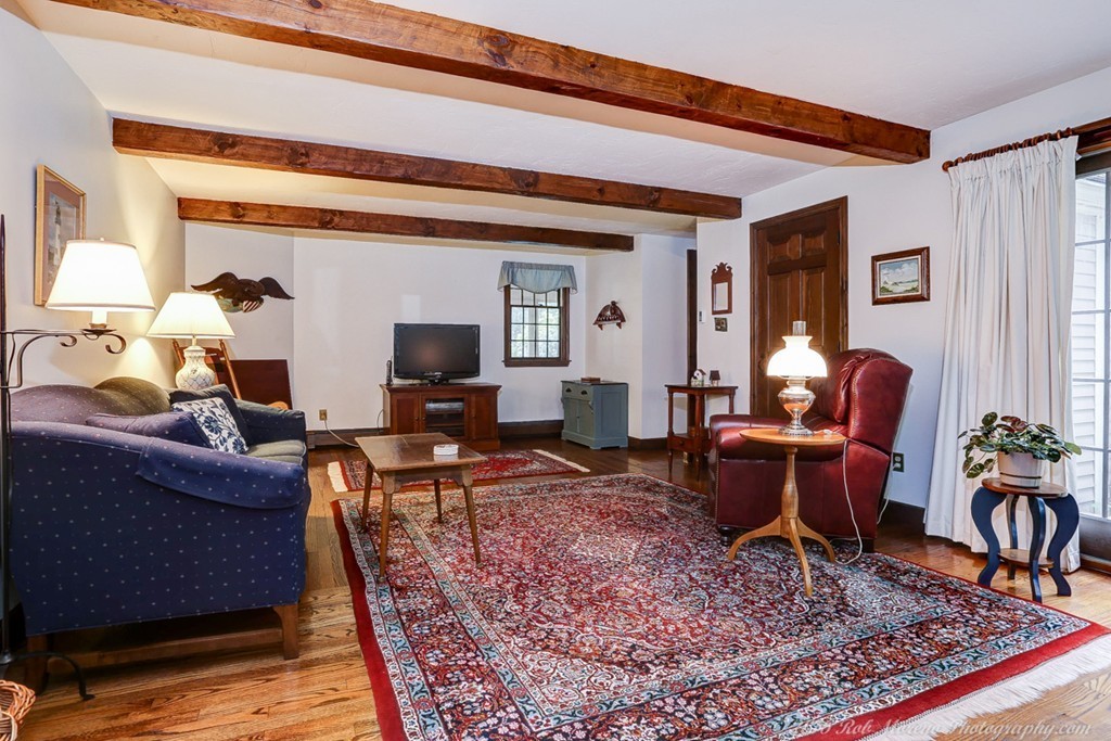 18 High Ridge Road Boxford, MA 01921 - Photo 14 of 30 a living room with furniture and a rug