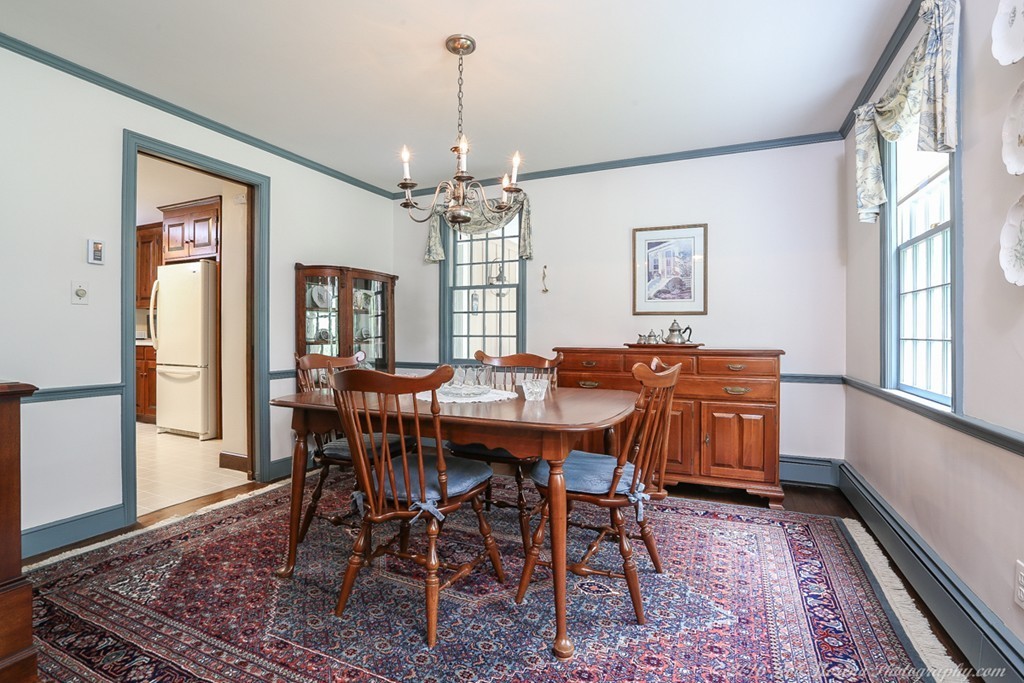 18 High Ridge Road Boxford, MA 01921 - Photo 8 of 30 a view of a dining room with furniture window and wooden floor
