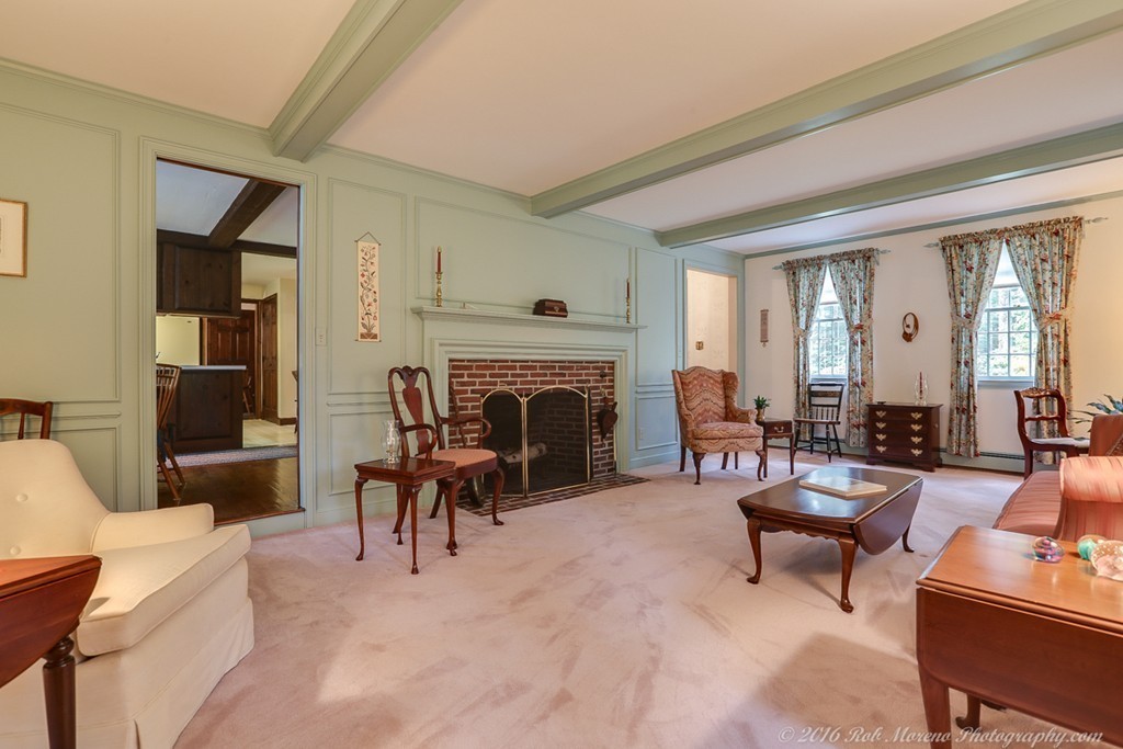 18 High Ridge Road Boxford, MA 01921 - Photo 9 of 30 a living room with furniture and a fireplace