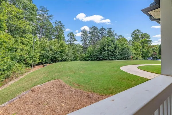 a view of a house with a sink and yard