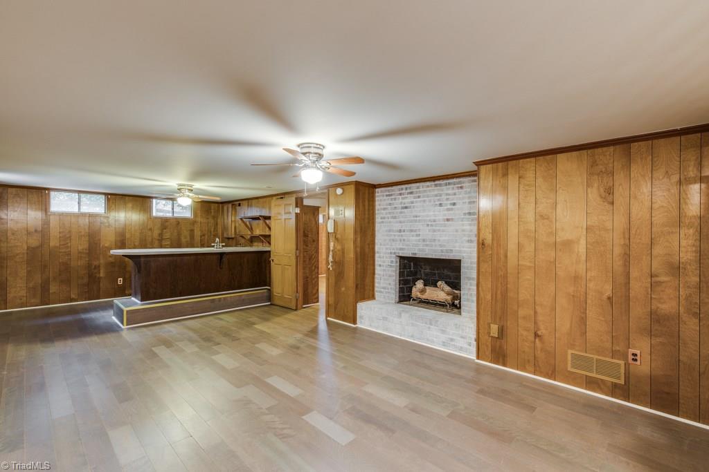 4180 Witherow Road Winston-Salem, NC 27106 - Photo 20 of 24 Lots of space to spread out and relax by the warm fire