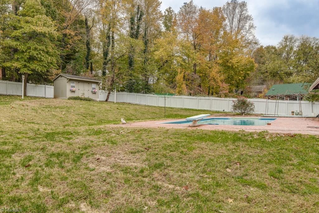 4180 Witherow Road Winston-Salem, NC 27106 - Photo 24 of 24 Beautiful fenced in back yard with swimming pool for those Hot summer days