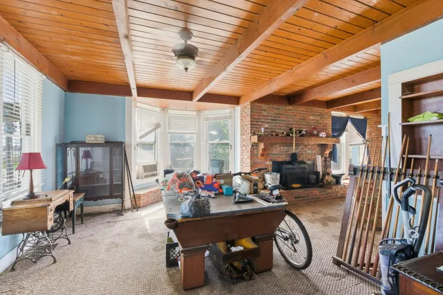 a outdoor space with patio lots of furniture and white walls