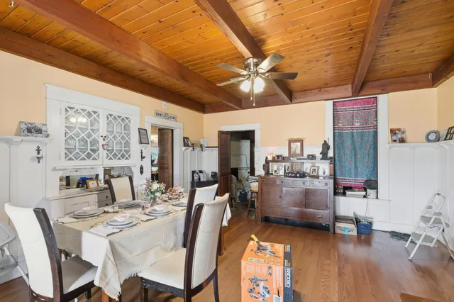 a view of a dining room with furniture