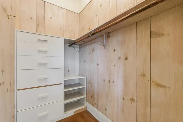 a backyard of a house with outdoor seating