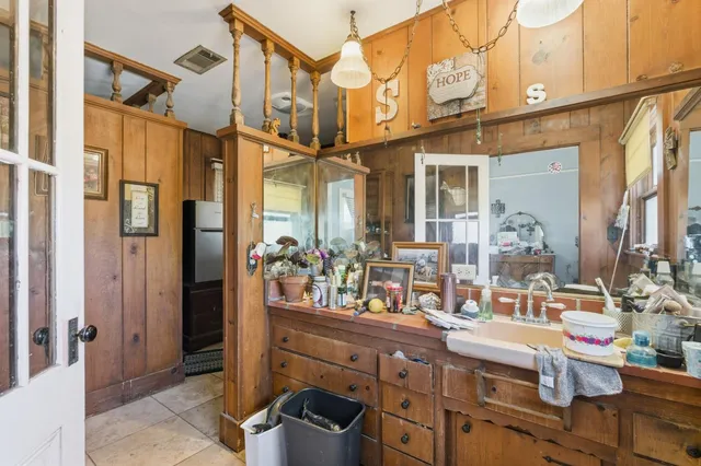an aerial view of a house with a lake view