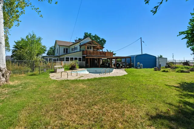 a view of backyard with green space