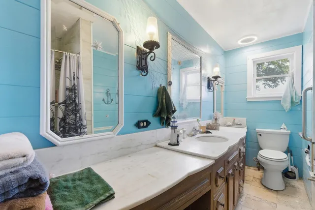 a bathroom with a shower curtain
