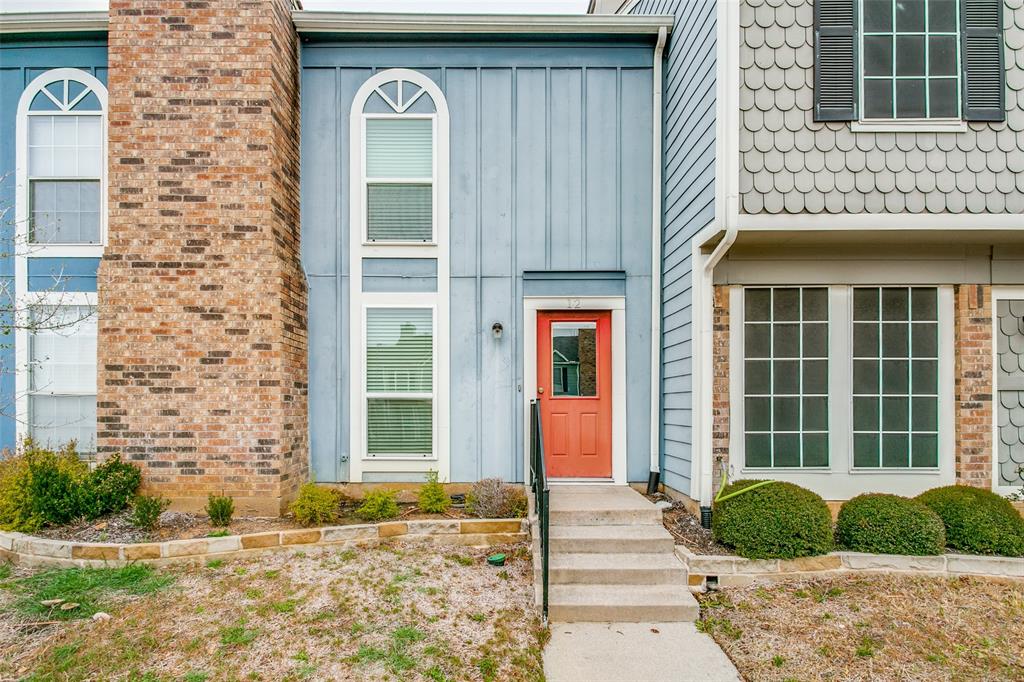 Property entrance with cute red door