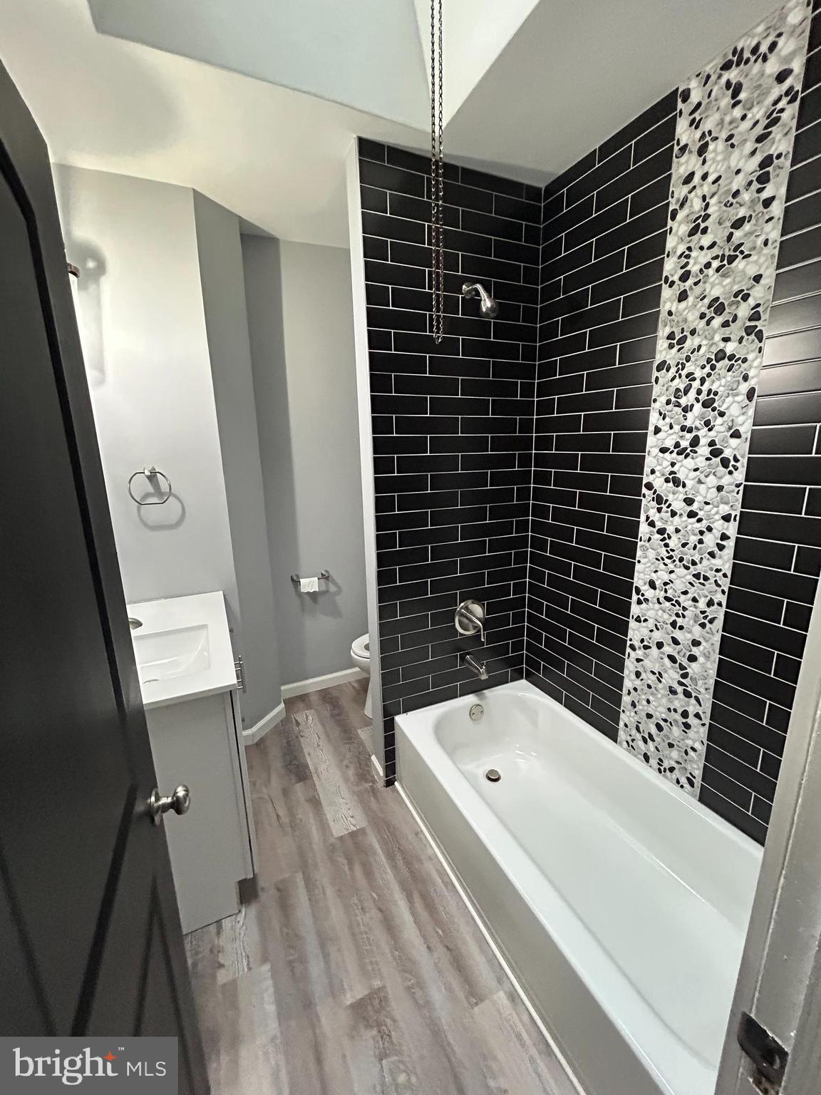 1116 Sanger Street Philadelphia, PA 19124 - Photo 20 of 47 a bathroom with a bathtub and shower