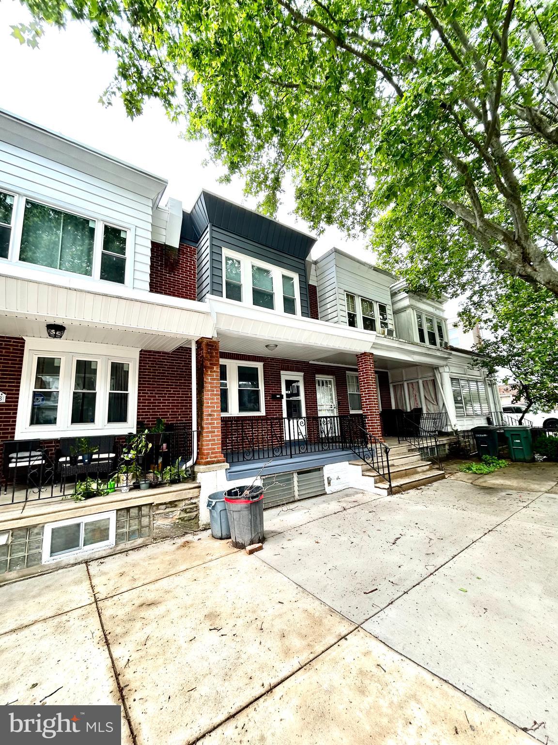 1116 Sanger Street Philadelphia, PA 19124 - Photo 2 of 47 a front view of a building with street view