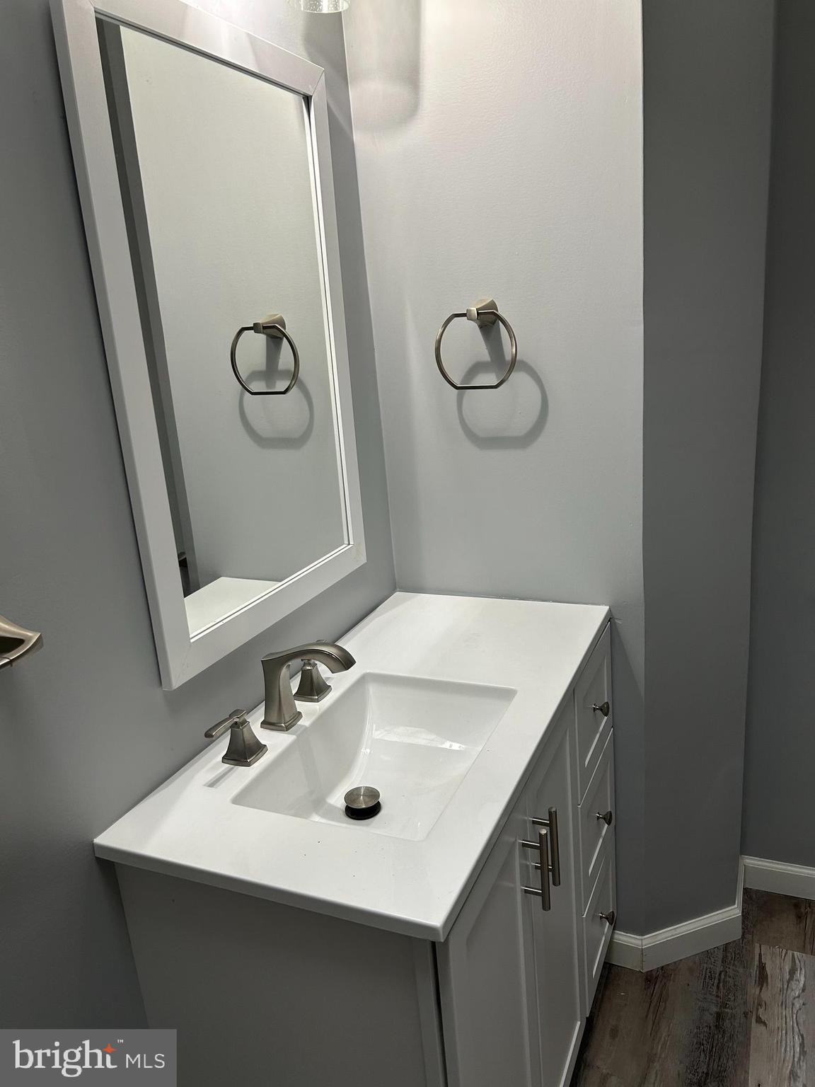 1116 Sanger Street Philadelphia, PA 19124 - Photo 21 of 47 a bathroom with a sink vanity and mirror