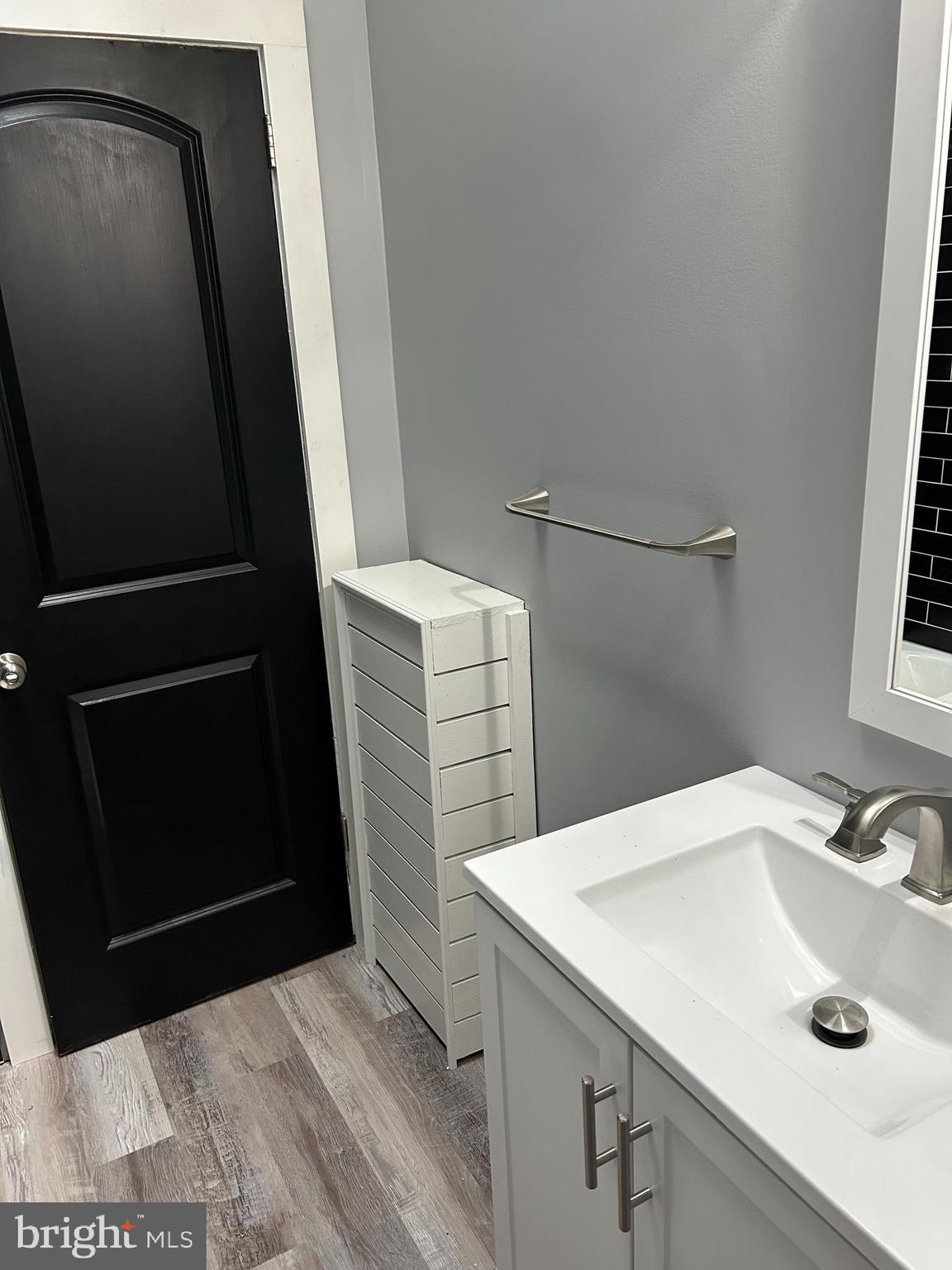 1116 Sanger Street Philadelphia, PA 19124 - Photo 23 of 47 a bathroom with a sink and a mirror