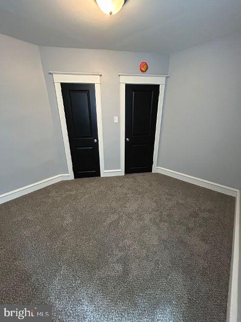 1116 Sanger Street Philadelphia, PA 19124 - Photo 26 of 47 a view of an empty room with closet and mirror