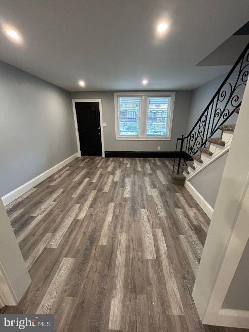 1116 Sanger Street Philadelphia, PA 19124 - Photo 4 of 47 a view of an empty room with a window and stairs