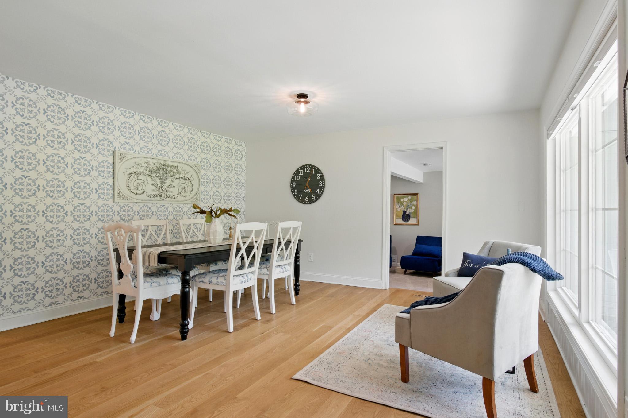 3633 Valley Road Ellicott City, MD 21042 - Photo 27 of 72 a view of a dining room with furniture and wooden floor