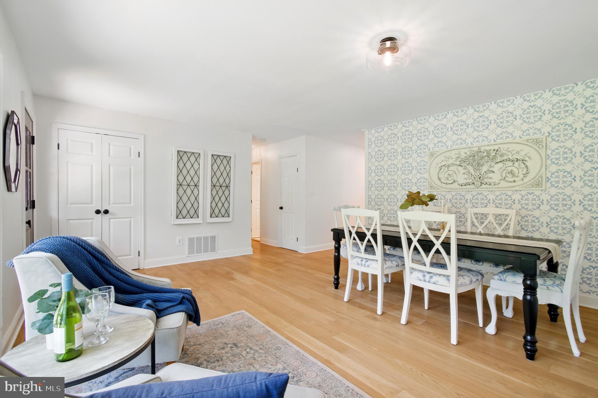 3633 Valley Road Ellicott City, MD 21042 - Photo 29 of 72 a living room with furniture dining table and wooden floor