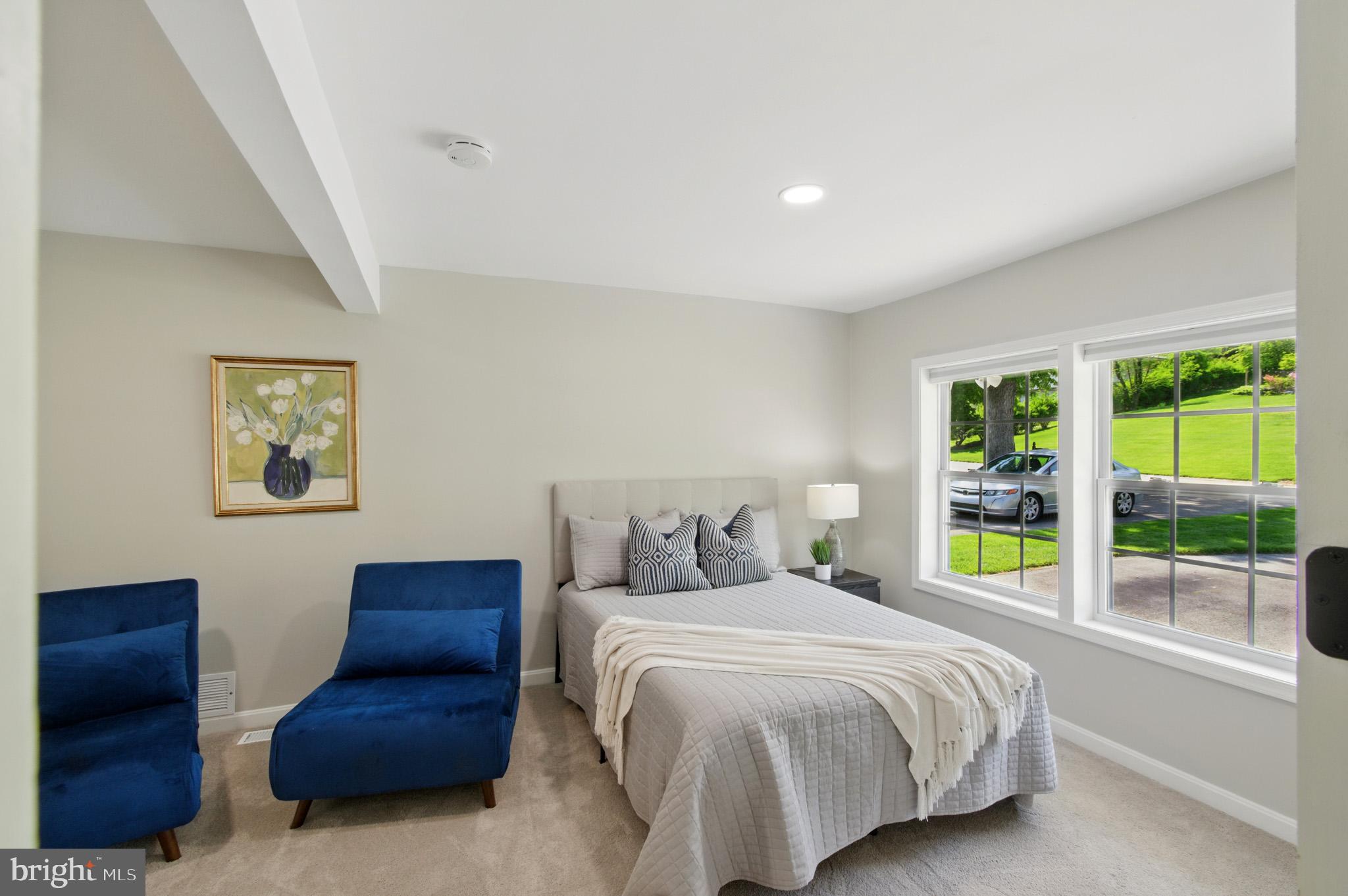3633 Valley Road Ellicott City, MD 21042 - Photo 38 of 72 a bedroom with a large bed and a large window