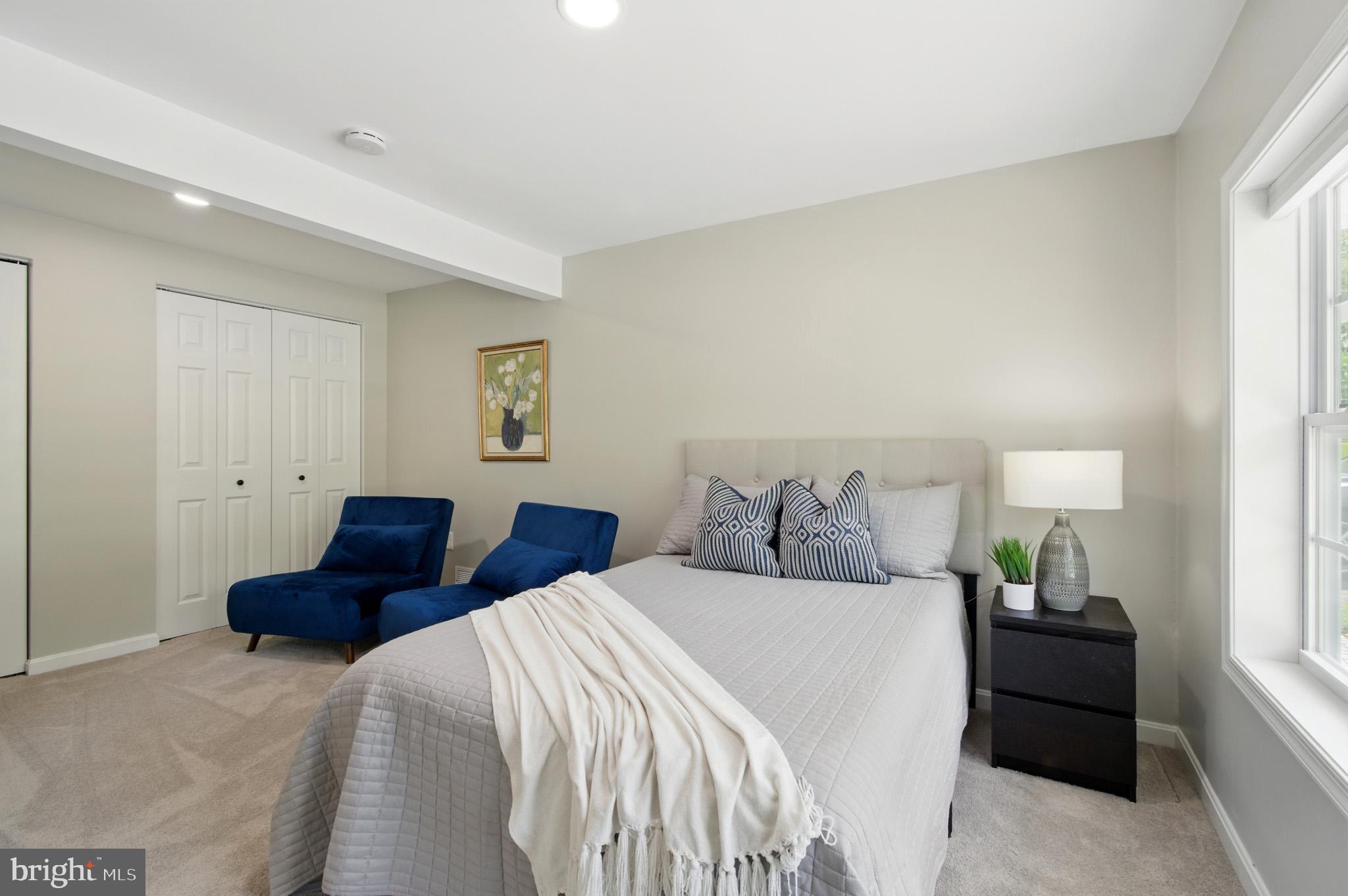 3633 Valley Road Ellicott City, MD 21042 - Photo 39 of 72 a bedroom with two beds and a couch