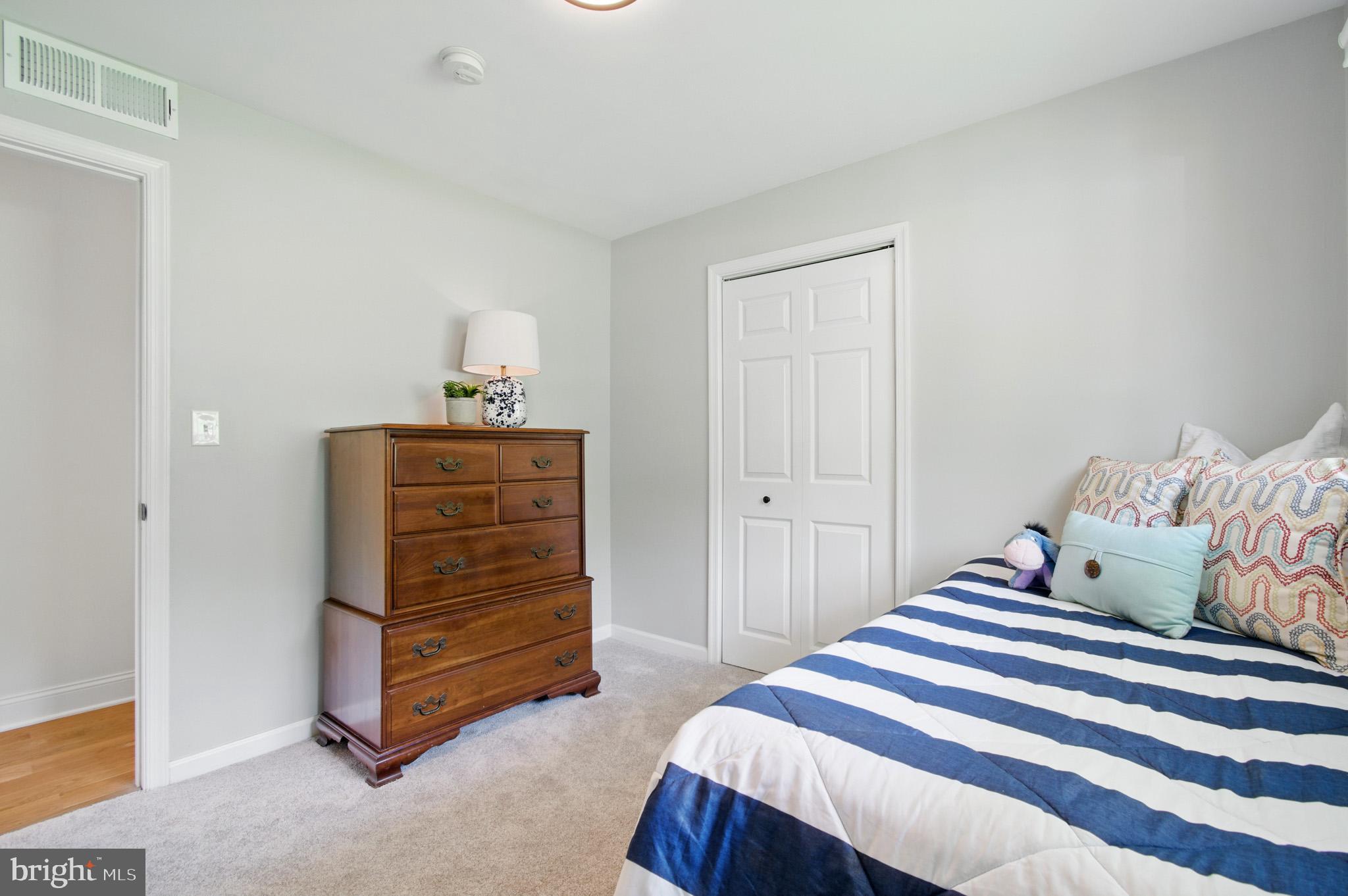 3633 Valley Road Ellicott City, MD 21042 - Photo 43 of 72 a bedroom with a bed and a dresser