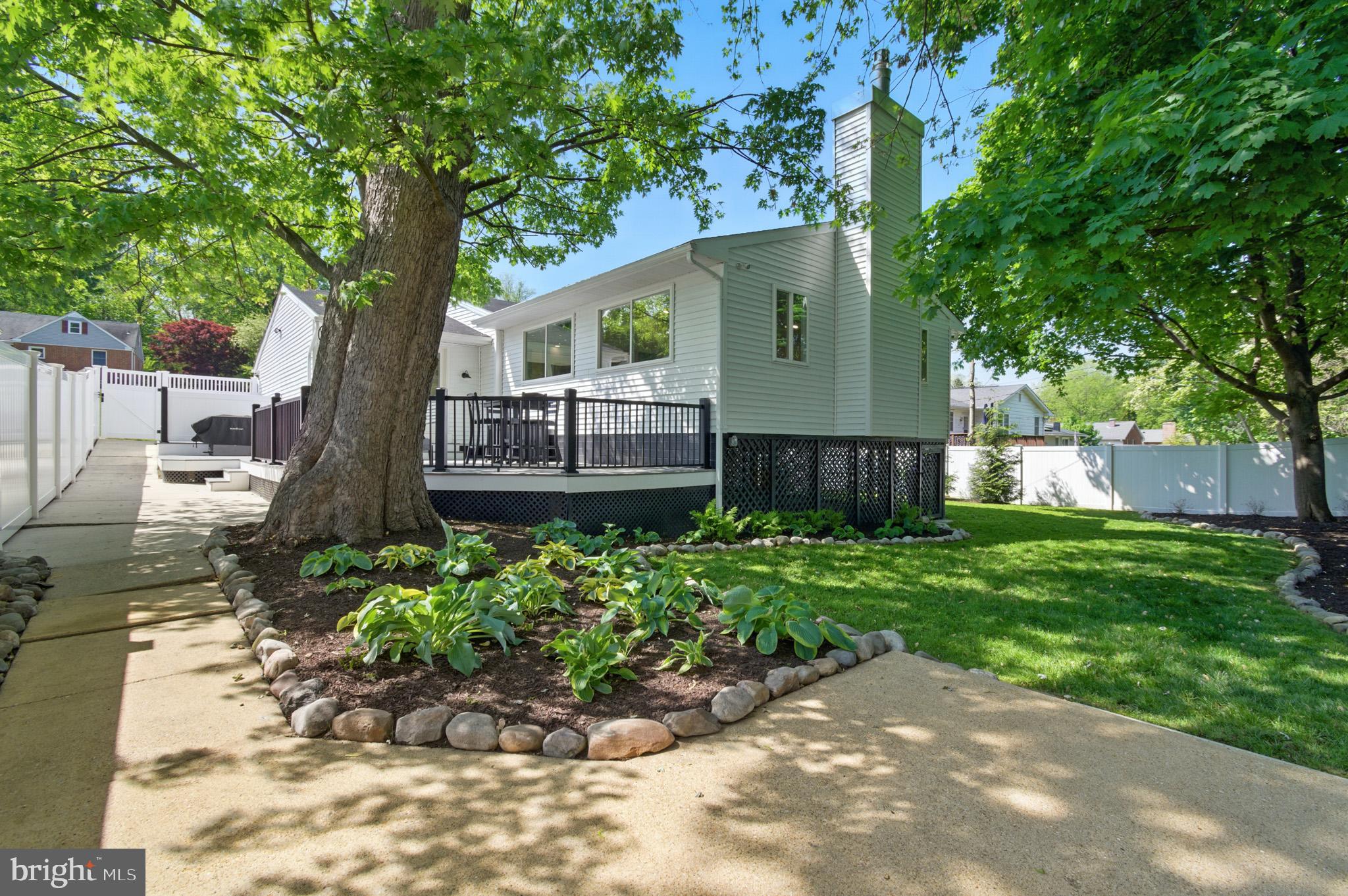 3633 Valley Road Ellicott City, MD 21042 - Photo 58 of 72 a front view of a house with garden