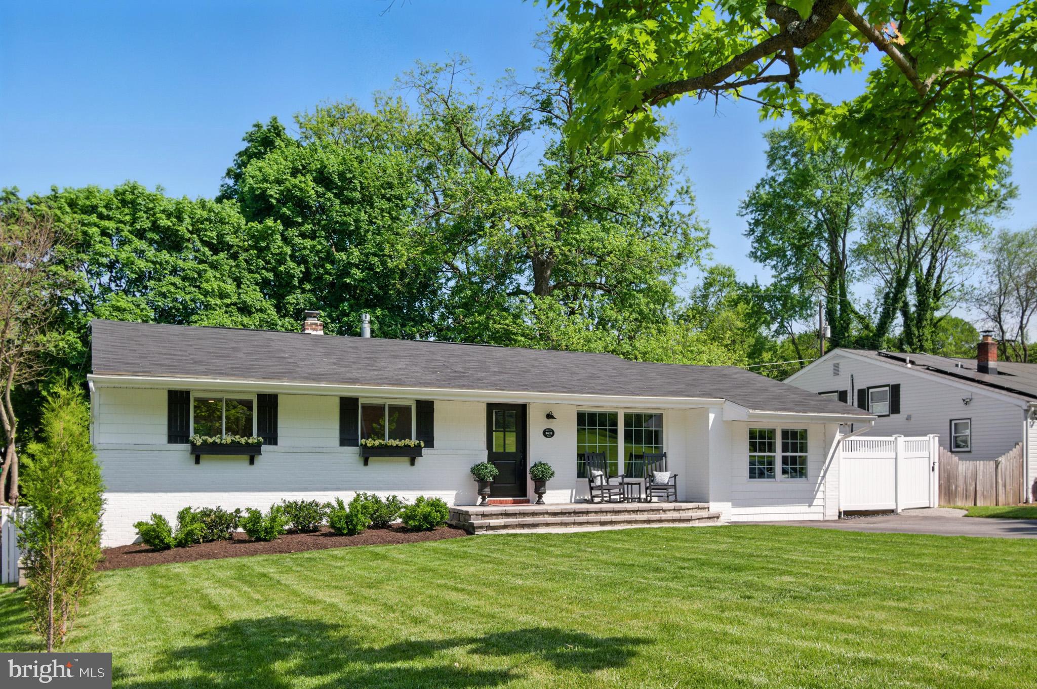 3633 Valley Road Ellicott City, MD 21042 - Photo 62 of 72 a front view of a house with a garden and porch