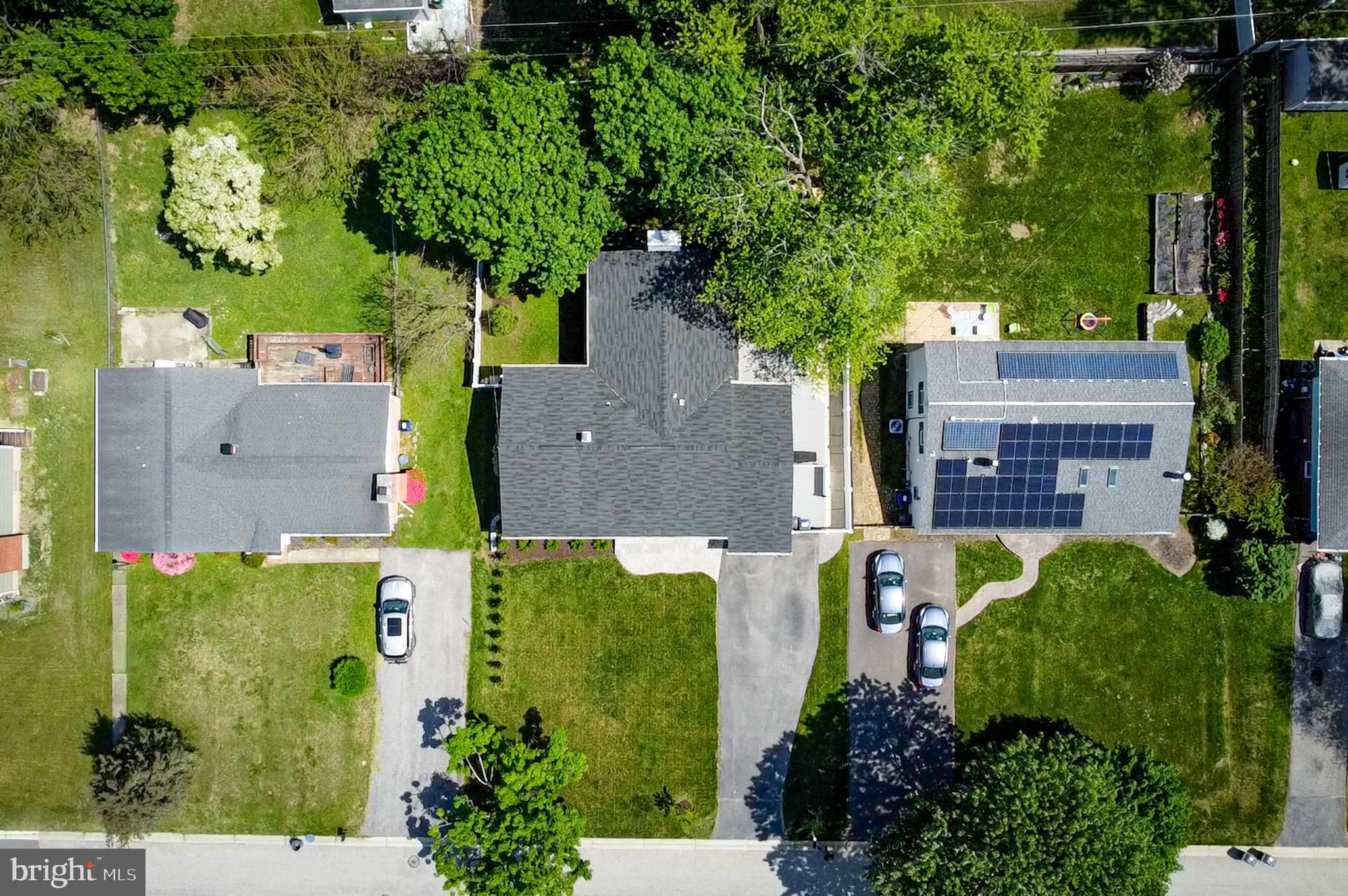 3633 Valley Road Ellicott City, MD 21042 - Photo 67 of 72 an aerial view of a house with a yard and large trees