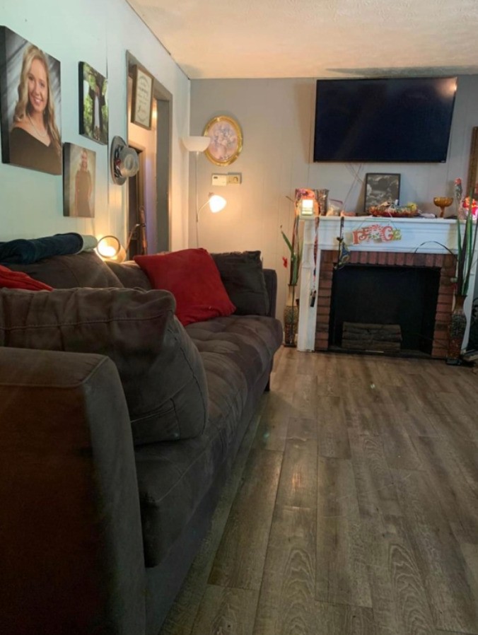 2058 Jefferson Road Smithville, TN 37166 - Photo 4 of 10 a living room with furniture and a flat screen tv