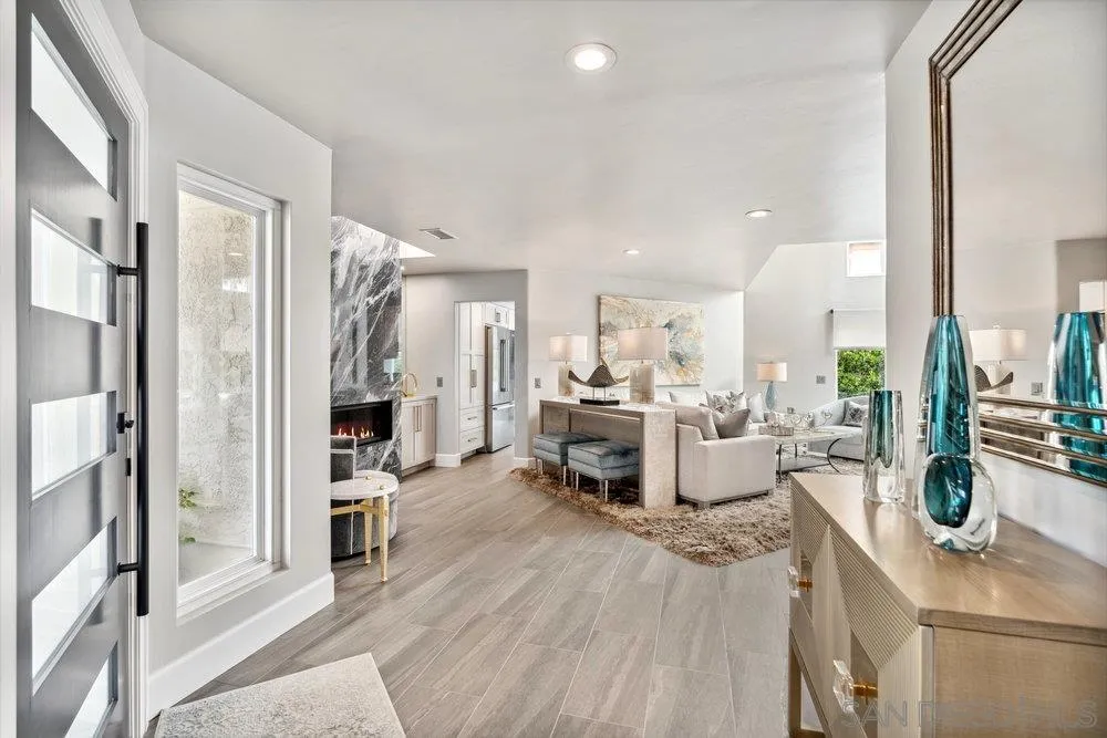 12 Mardi Gras Road Coronado, CA 92118 - Photo 12 of 70 a living room with furniture a large window and stainless steel appliances