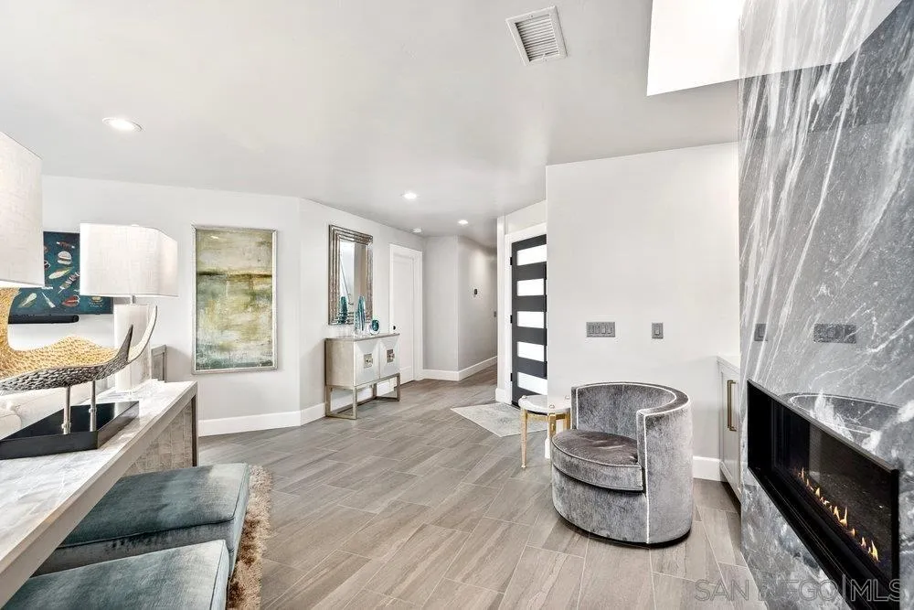 12 Mardi Gras Road Coronado, CA 92118 - Photo 14 of 70 a living room with furniture and a wooden floor