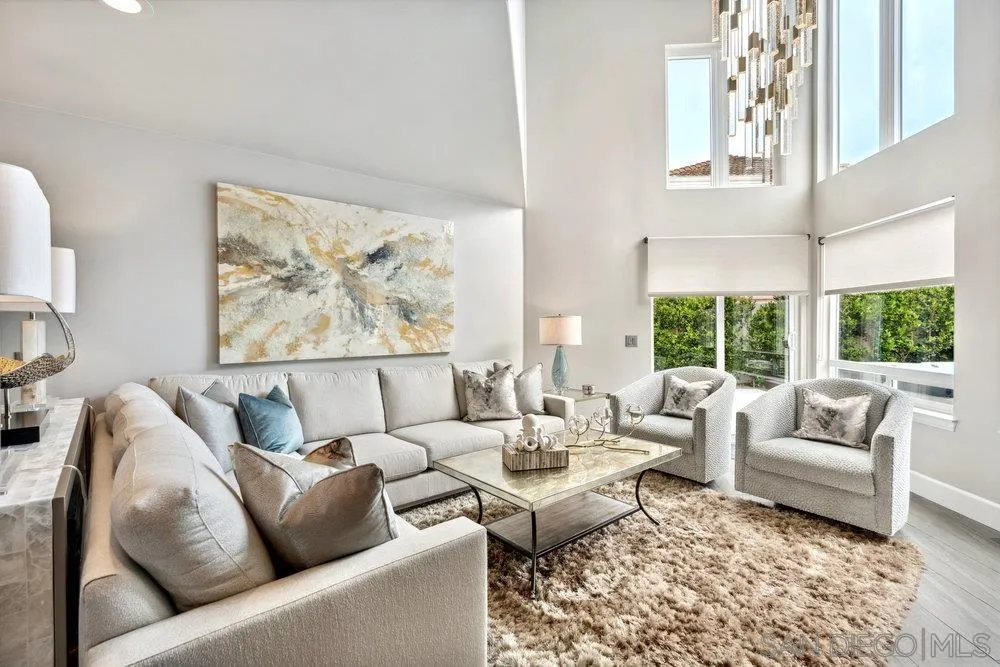 12 Mardi Gras Road Coronado, CA 92118 - Photo 18 of 70 a living room with furniture and a large window