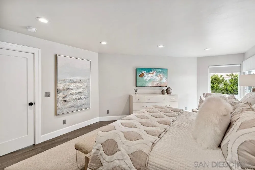 12 Mardi Gras Road Coronado, CA 92118 - Photo 25 of 70 a bedroom with a large bed and a window