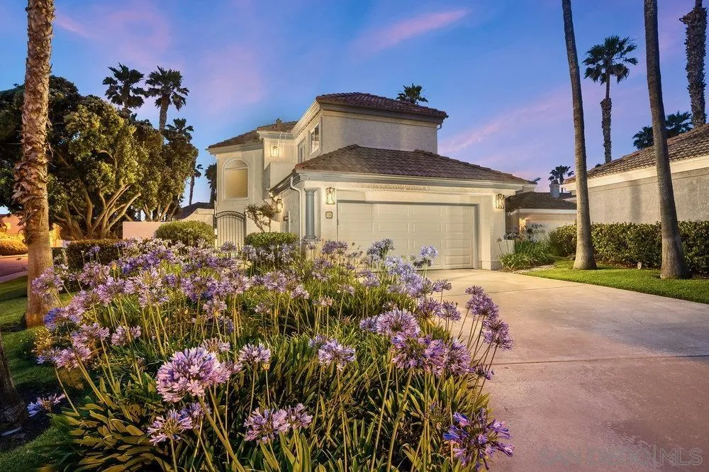 12 Mardi Gras Road Coronado, CA 92118 - Photo 3 of 70 a front view of a house with a yard and a yard