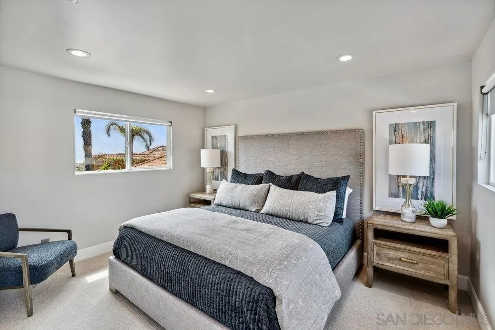 12 Mardi Gras Road Coronado, CA 92118 - Photo 32 of 70 a bedroom with a large bed and a couch