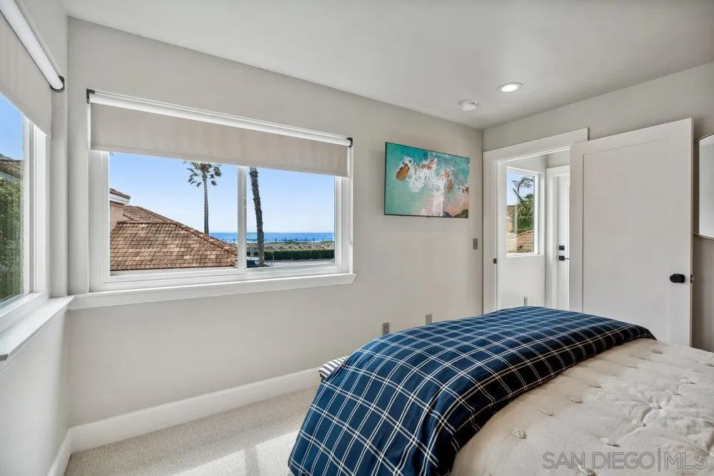 12 Mardi Gras Road Coronado, CA 92118 - Photo 34 of 70 a bedroom with a bed and a window