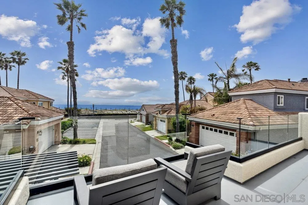 12 Mardi Gras Road Coronado, CA 92118 - Photo 42 of 70 a roof deck with couches and potted plants