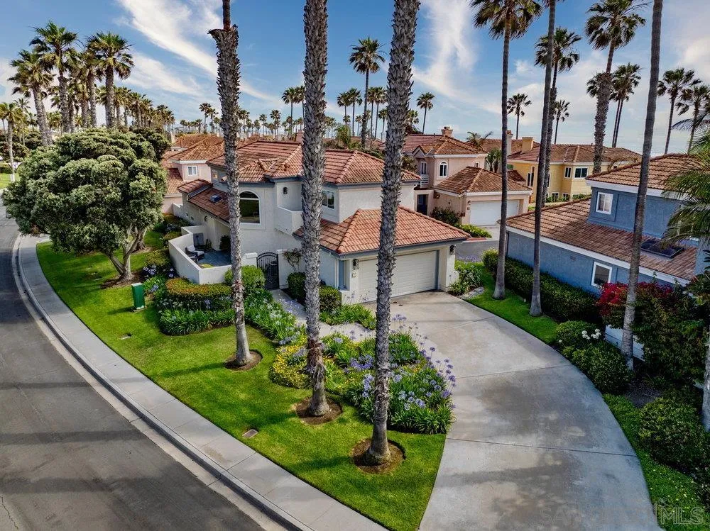 12 Mardi Gras Road Coronado, CA 92118 - Photo 60 of 70 a view of a garden with a building in the background