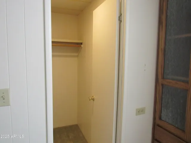 a view of a bathroom from the door