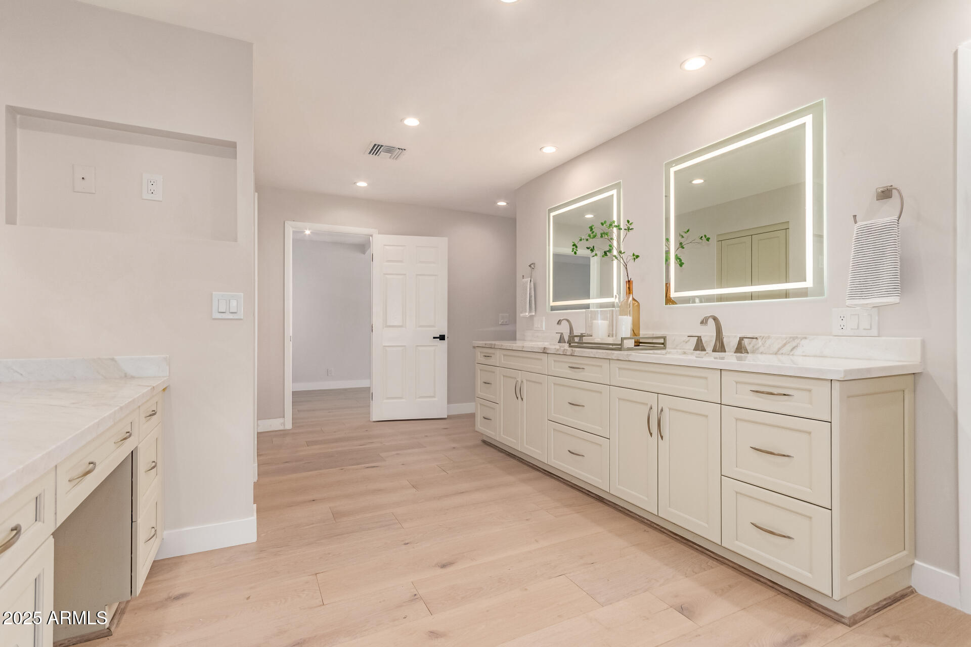 3301 East Rovey Avenue Paradise Valley, AZ 85253 - Photo 45 of 105 a spacious bathroom with a granite countertop sink mirror and a
