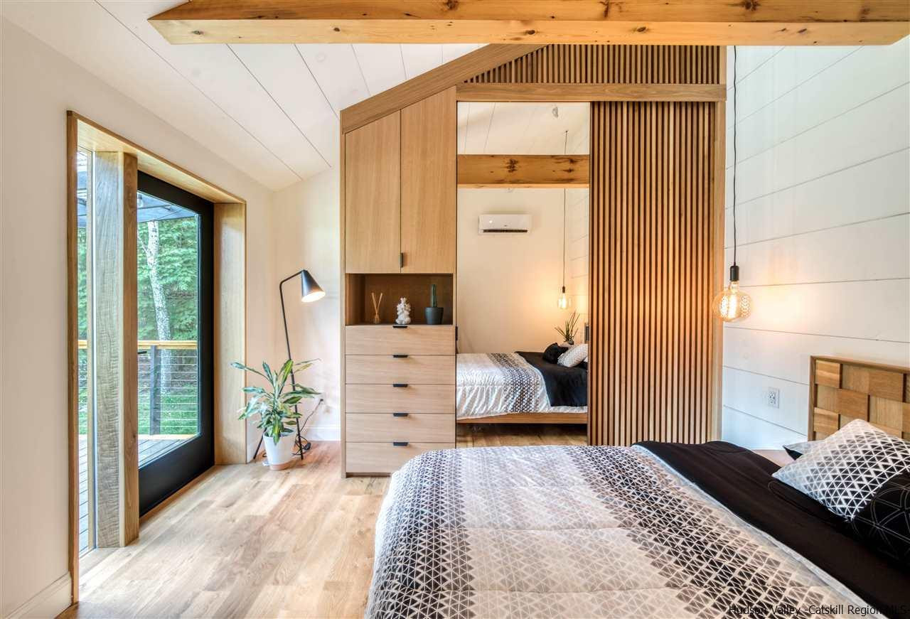 317 Sheldon Hill Road Olivebridge, NY 12461 - Photo 13 of 23 a bedroom with a bed and a window