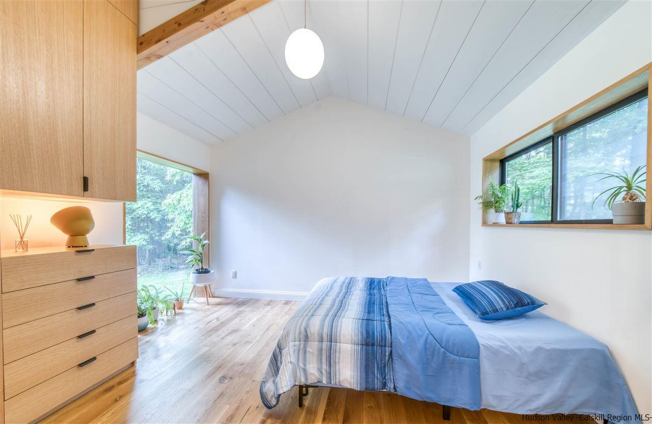 317 Sheldon Hill Road Olivebridge, NY 12461 - Photo 14 of 23 a bedroom with a bed and a window