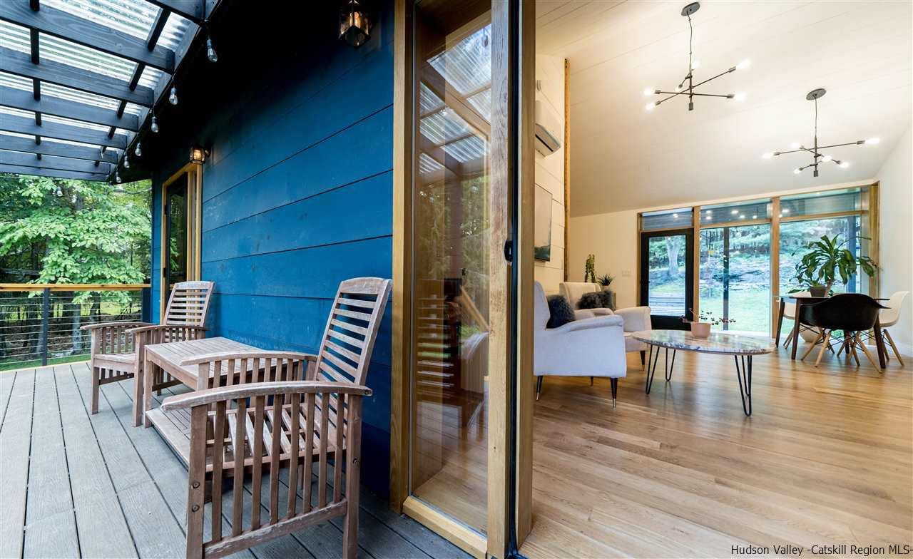 317 Sheldon Hill Road Olivebridge, NY 12461 - Photo 21 of 23 a view of a porch with chairs and backyard