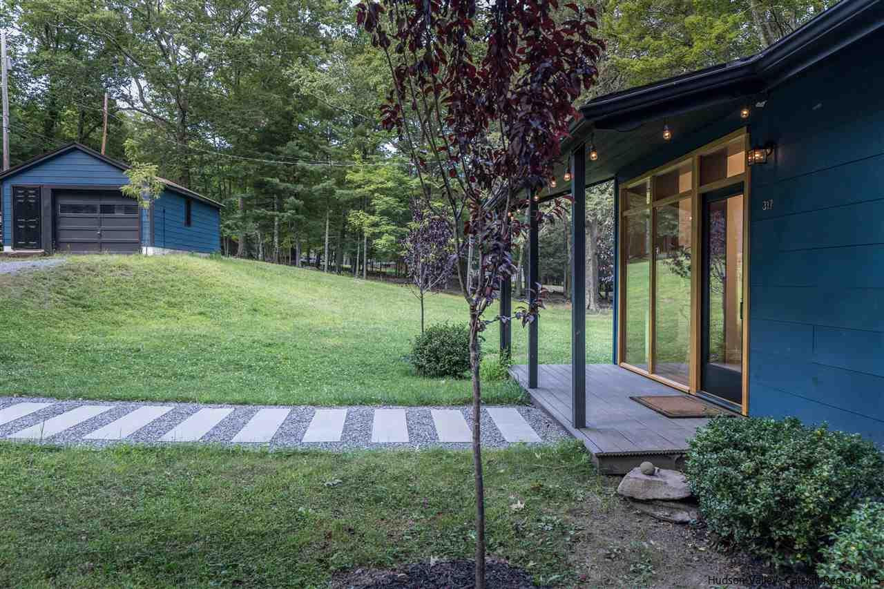 317 Sheldon Hill Road Olivebridge, NY 12461 - Photo 23 of 23 a view of a house with backyard and porch