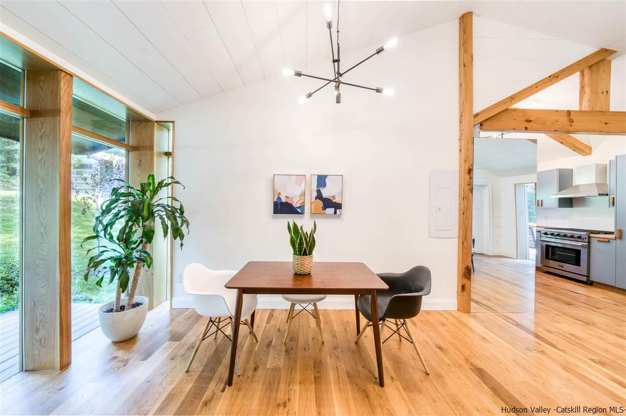 317 Sheldon Hill Road Olivebridge, NY 12461 - Photo 3 of 23 a view of a dining room with furniture window and wooden floor