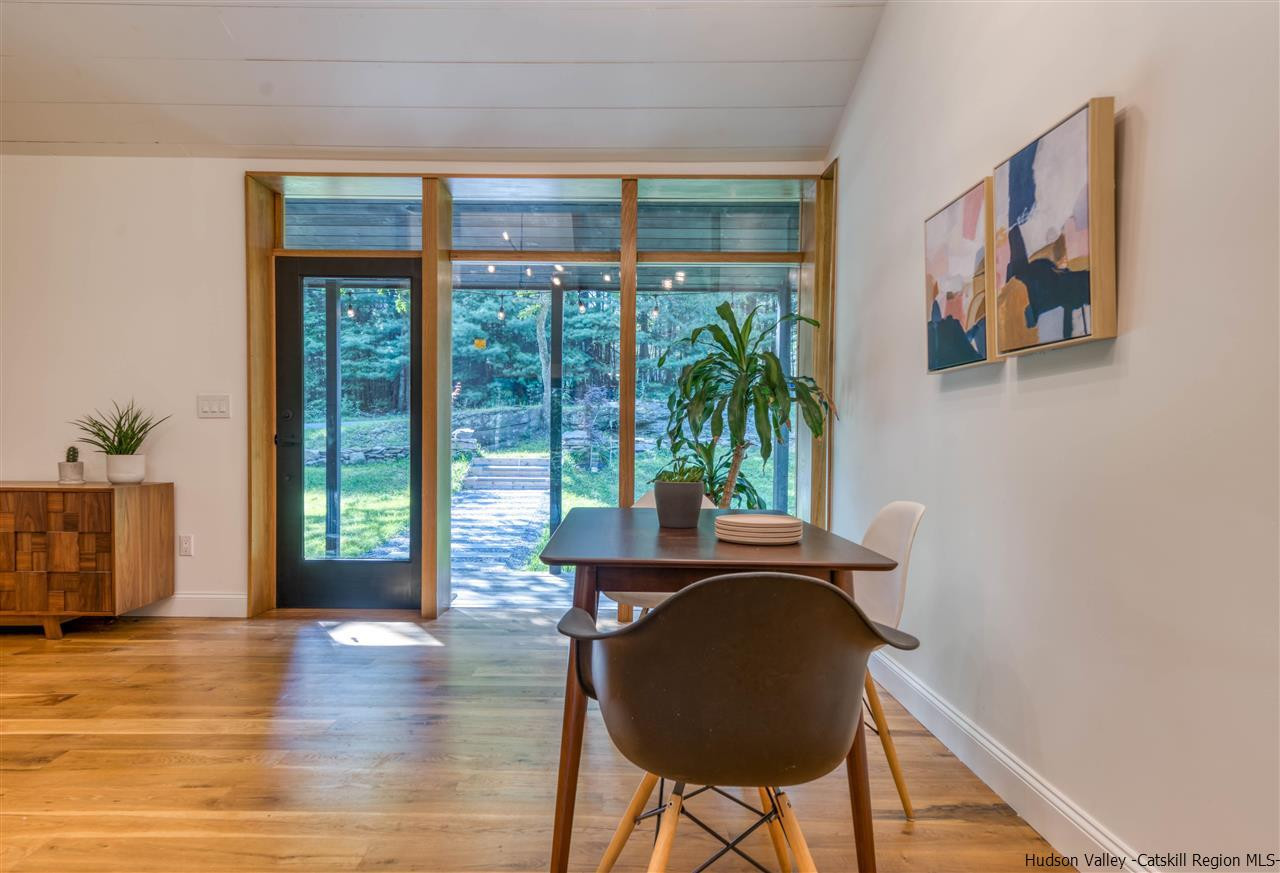 317 Sheldon Hill Road Olivebridge, NY 12461 - Photo 5 of 23 a view of a workspace room with wooden floor and furniture