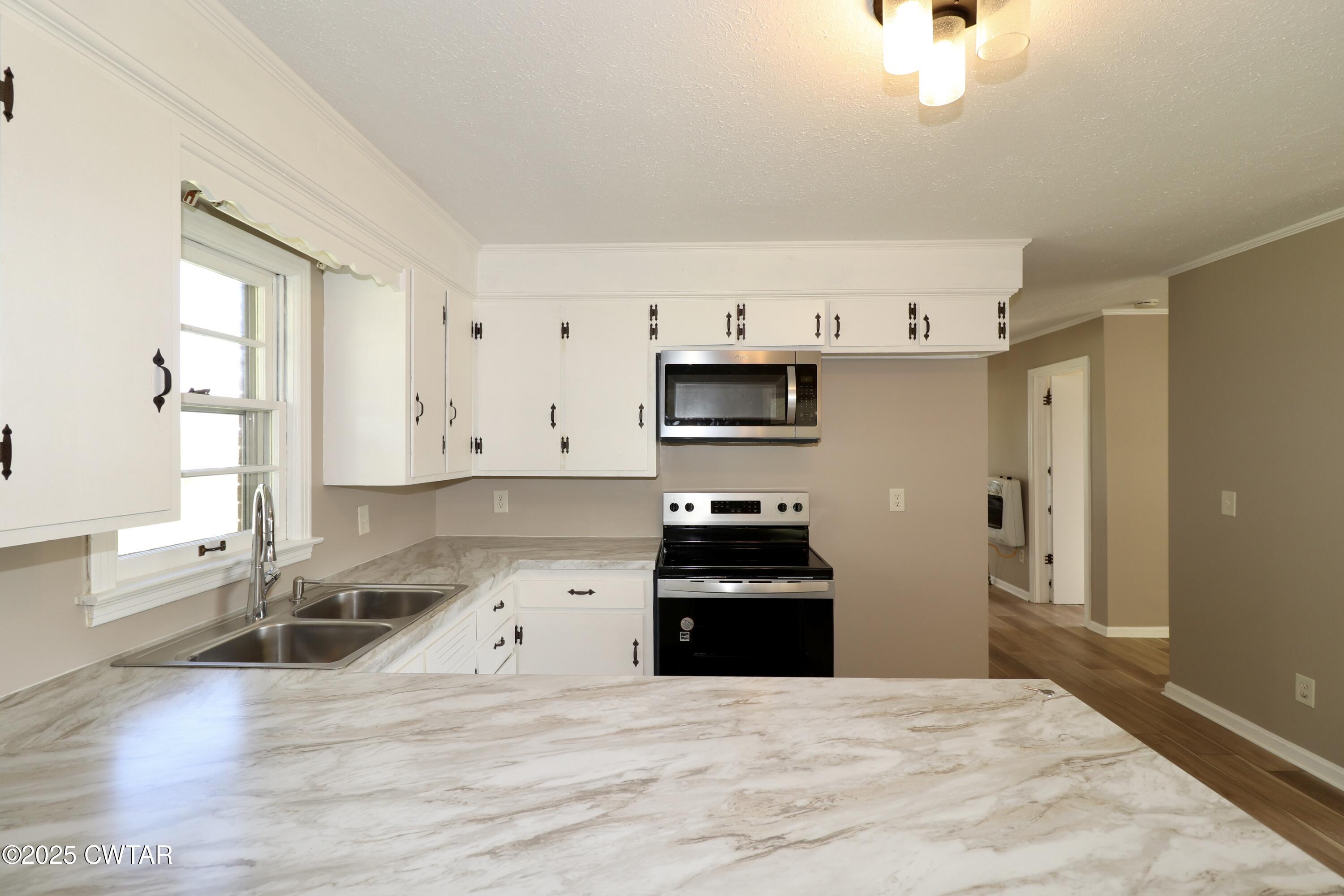 1009 Cotton Grove Road Jackson, TN 38305 - Photo 4 of 12 B5A45BB9-122C-4774-B8DD-13821AFE9A28_1_2