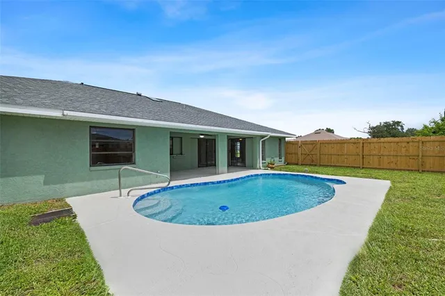 a view of outdoor space yard swimming pool and porch