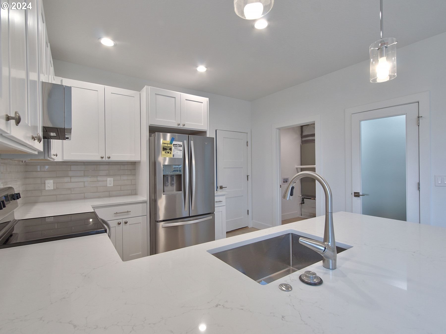 365 Northeast Oakview Drive Estacada, OR 97023 - Photo 14 of 39 a kitchen with stainless steel appliances granite countertop a refrigerator and a sink