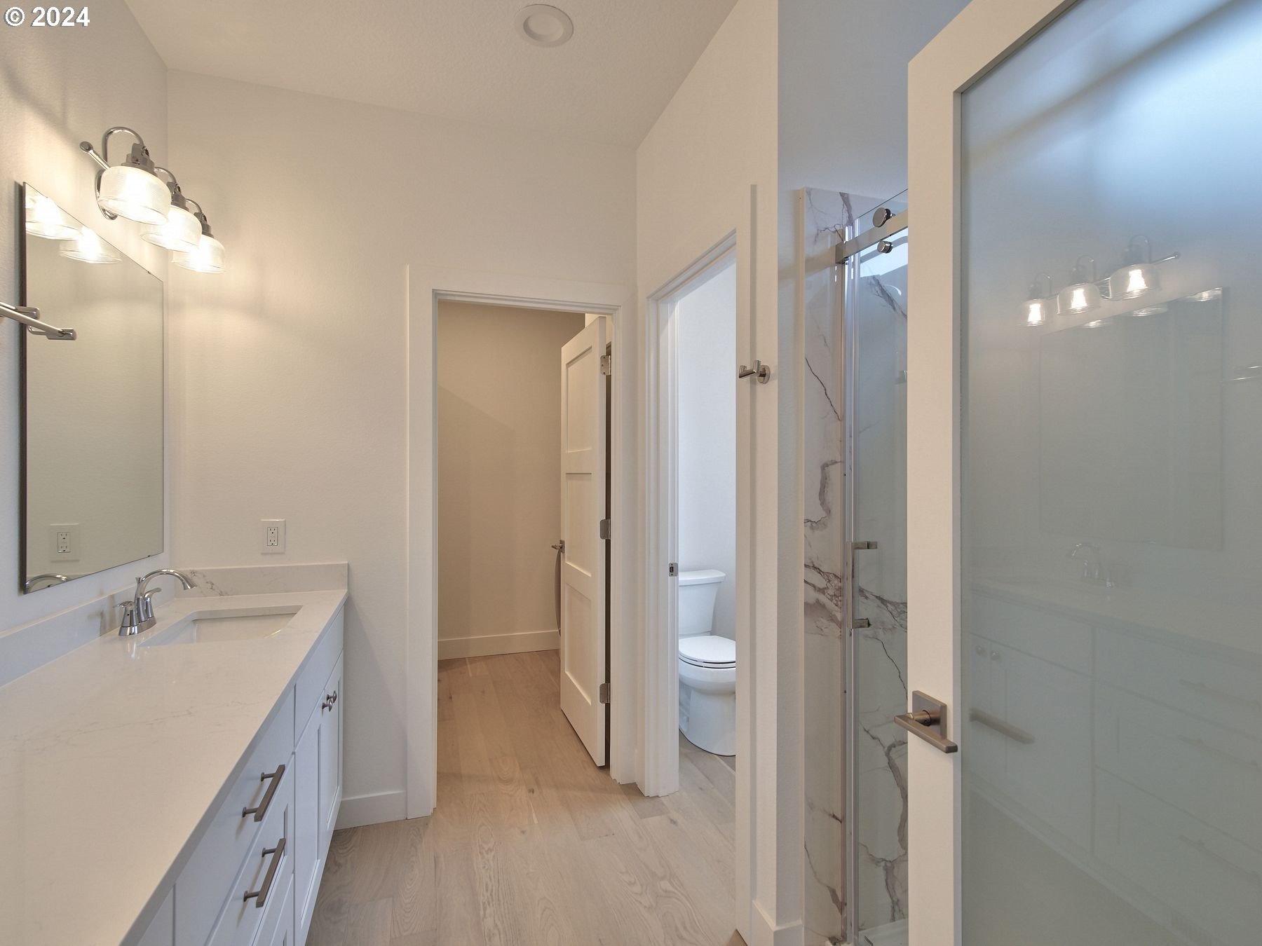 365 Northeast Oakview Drive Estacada, OR 97023 - Photo 21 of 39 a spacious bathroom with a granite countertop sink mirror and a toilet