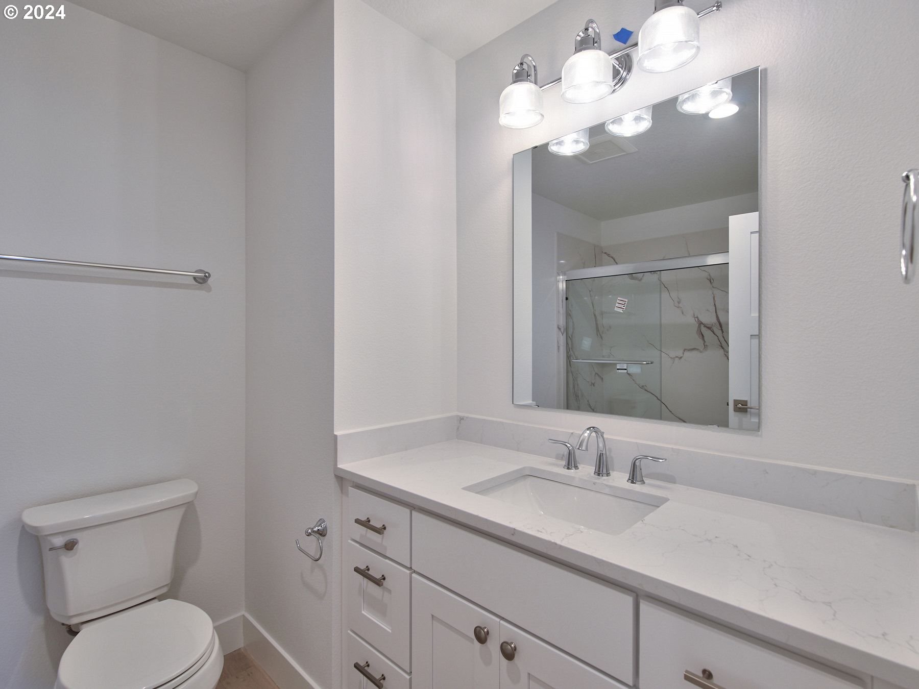 365 Northeast Oakview Drive Estacada, OR 97023 - Photo 32 of 39 a bathroom with a toilet a sink and mirror